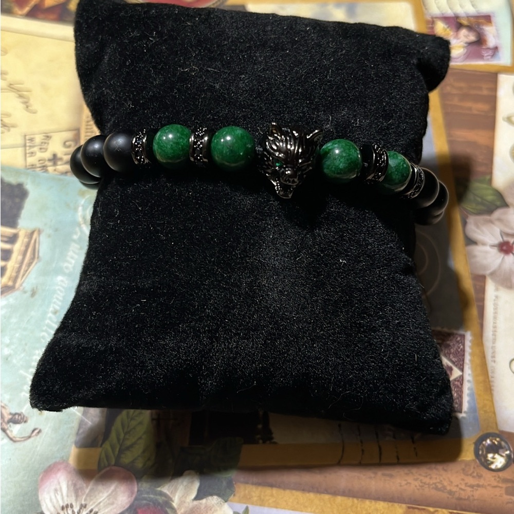 Green and Black Beaded Bracelet with Wolf Charm